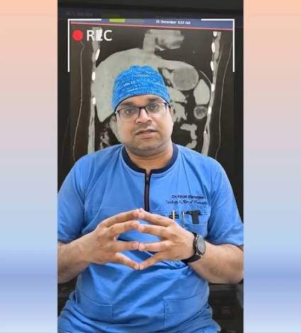 Dr. Kinjal Banerjee explaining a CT scan during a urology consultation